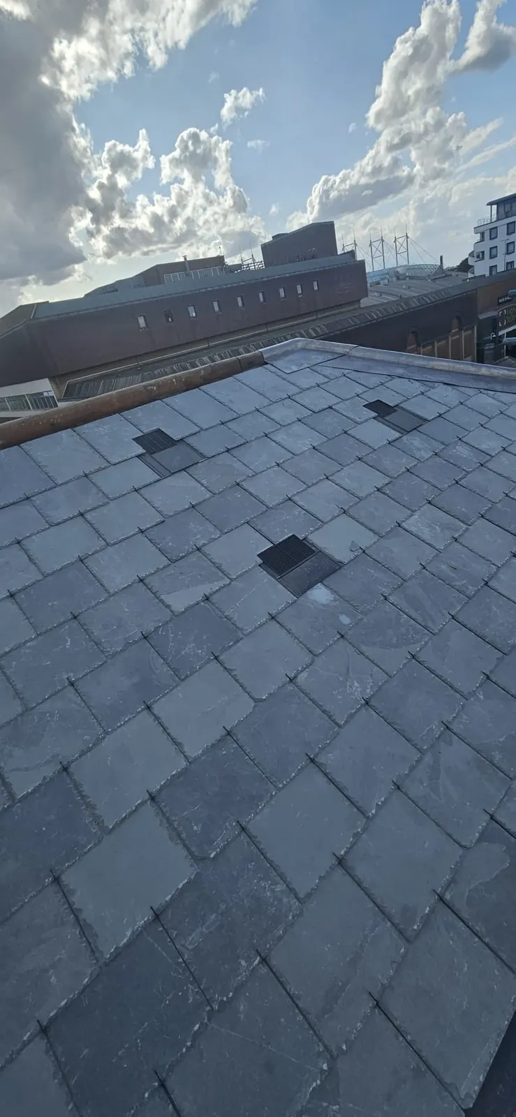 Slate roof vent installation in Bracknell