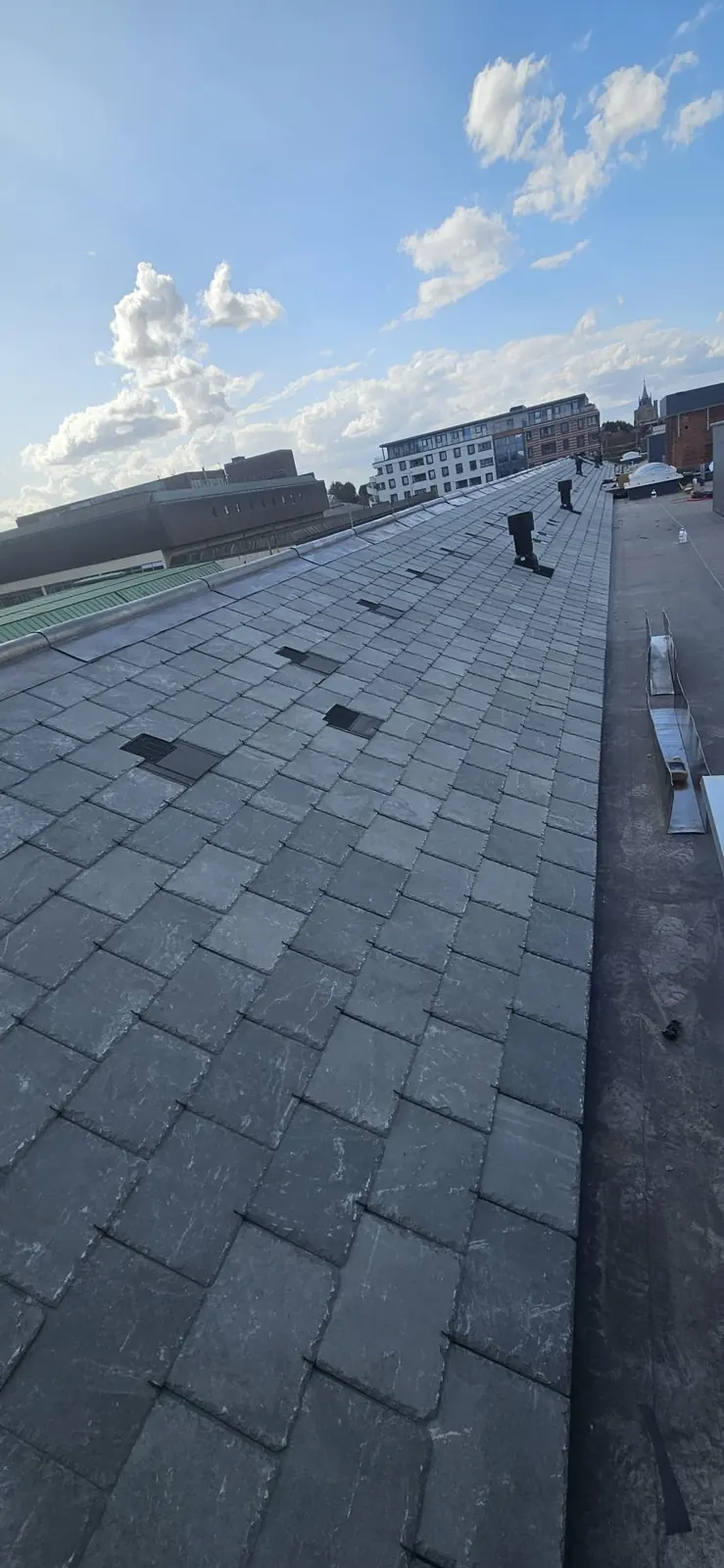 Slate roof with lead ridge and roof vents, Bracknell