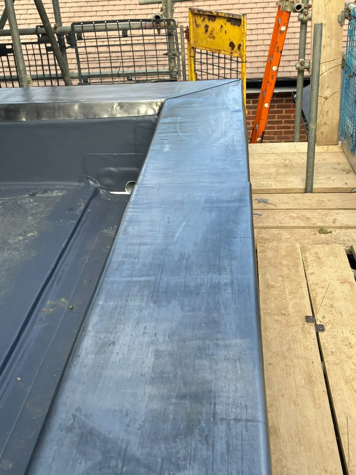 Close-up of parapet wall lead capping, Bracknell