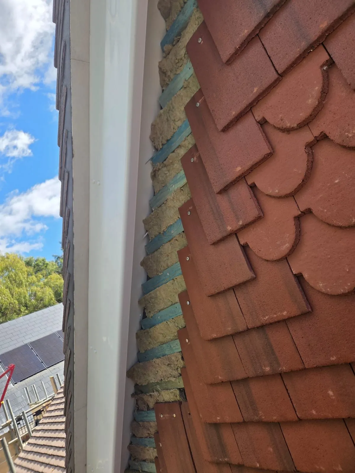 Clay tile hanging beside a white UPVC bargeboard, Berkshire