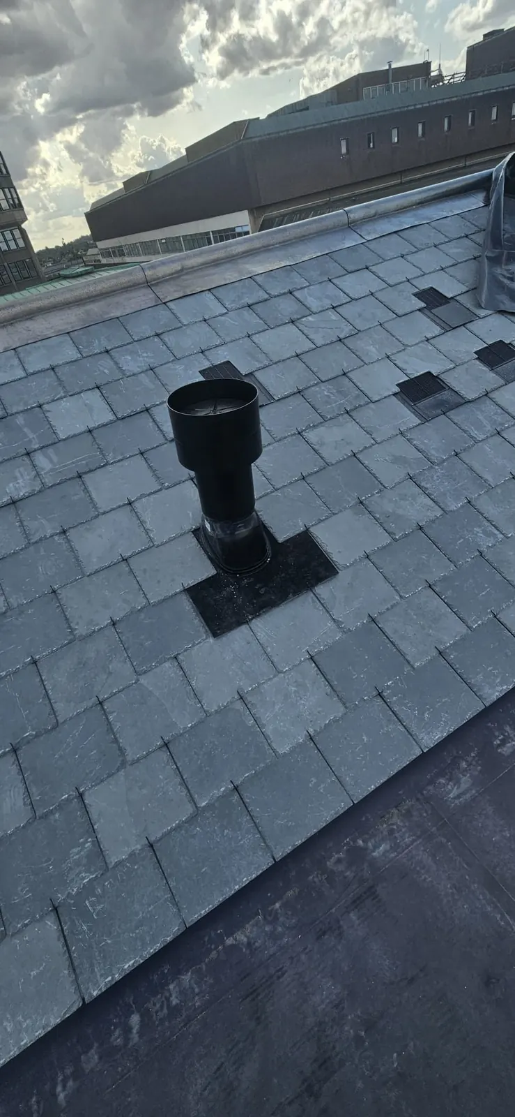 Roof vent installed on a slate roof in Bracknell
